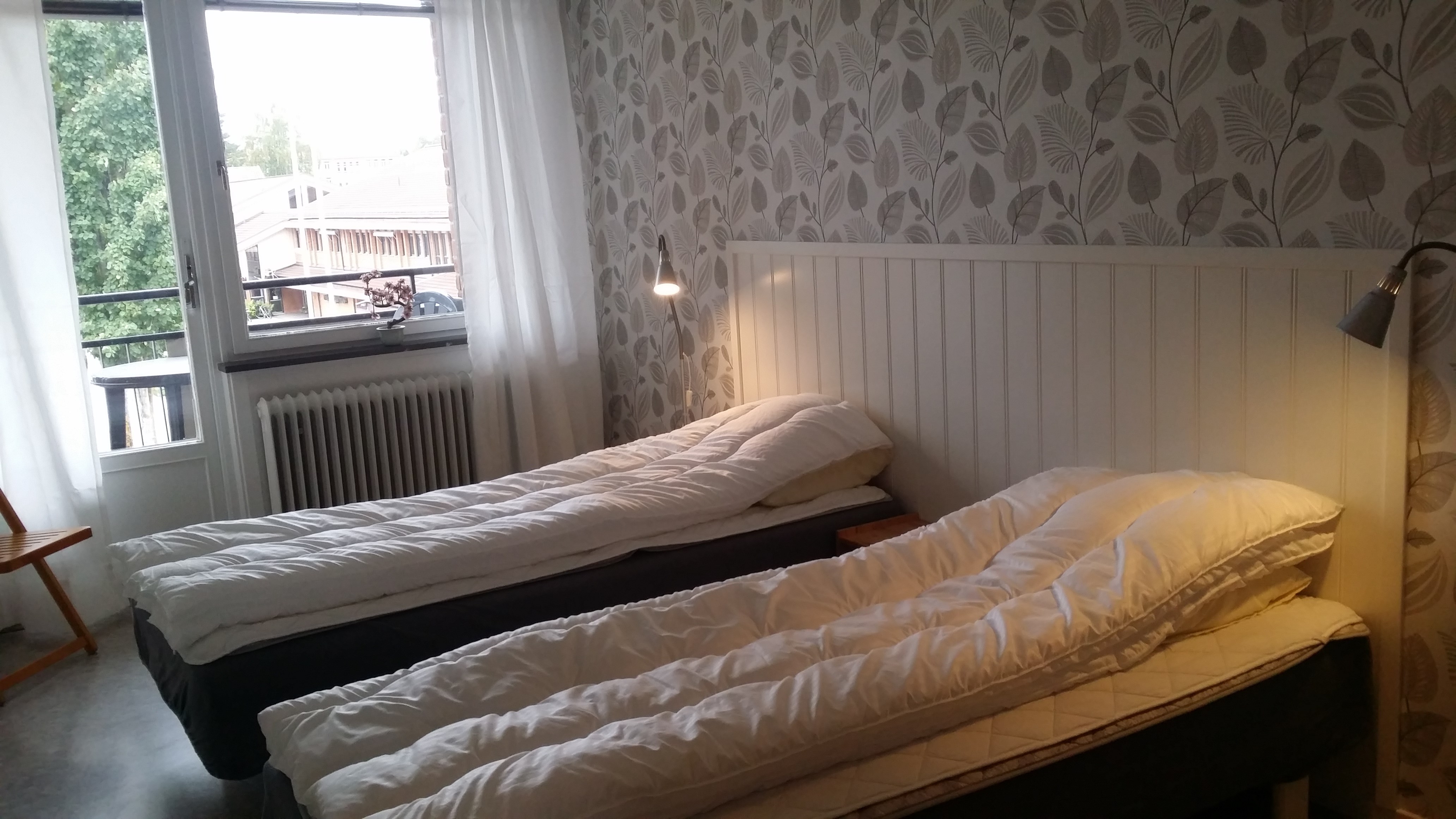 Bild på 2 sängar i turistlägenheten 3 rok